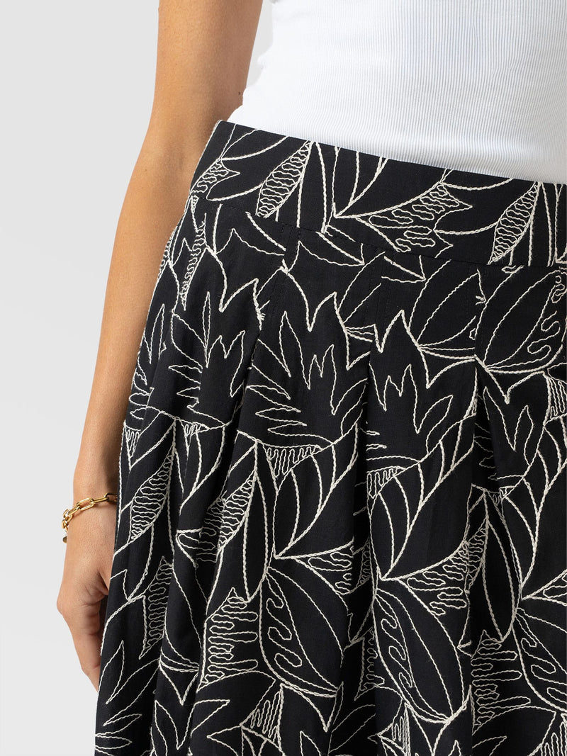 Eliza Pleated Skirt - Black Embroidered - Women's Skirts | Saint + Sofia® UK