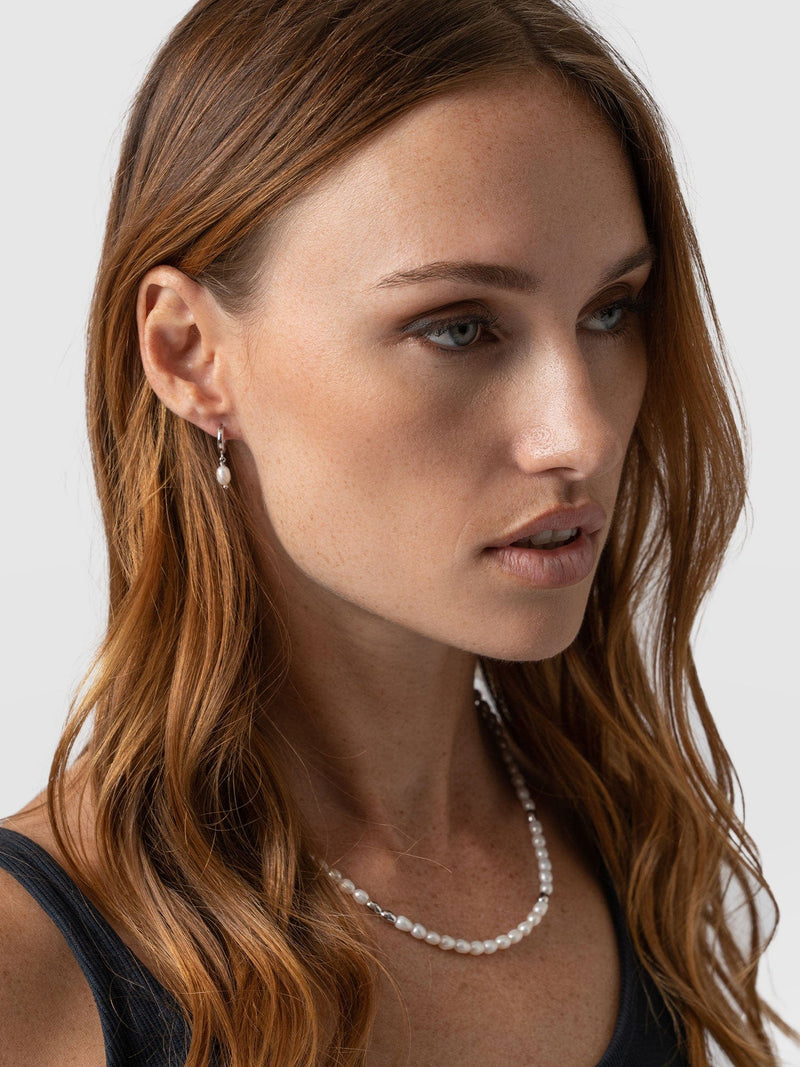Jacqueline Pearl Huggie Earrings - Silver