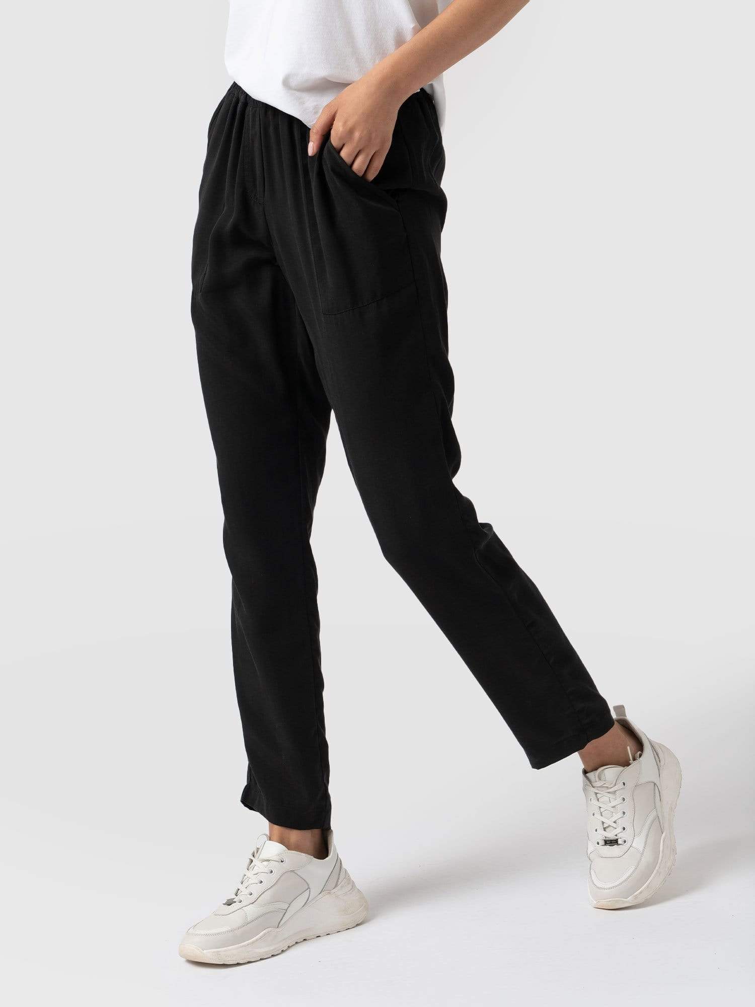 UNIVERSAL WORKS Oxford Trousers in Black | Endource